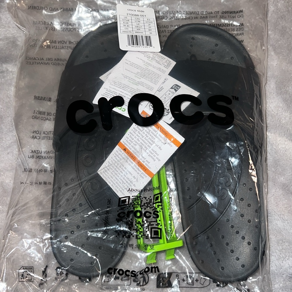 Crocs Adult Slide Sandals,
Black, W9/M7 new - Picture 2 of 4